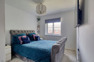 Bedroom One- click for photo gallery